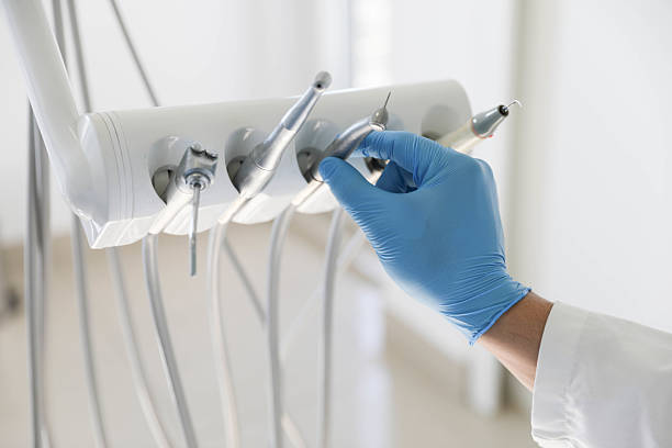 Professional Tooth Extraction technician working in Bee Cave, TX